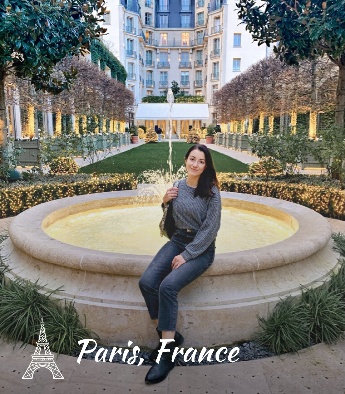 Home - Hotel Ritz Paris inner courtyard with illuminated fountain and trees