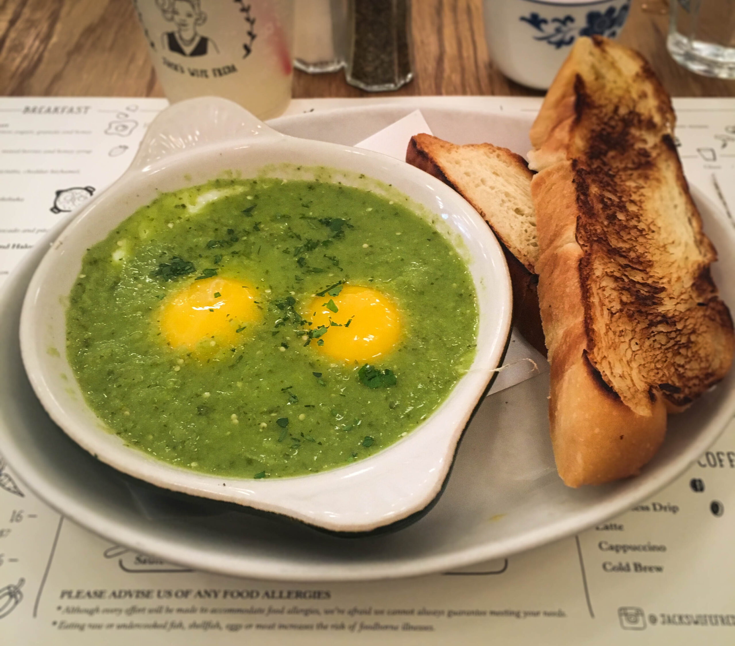 Green shakshuka and challah toast